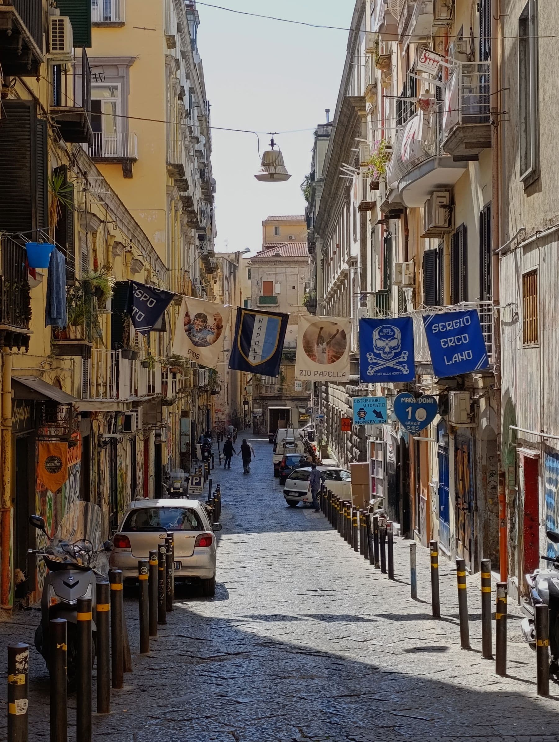 A street in Naples with banners overhead