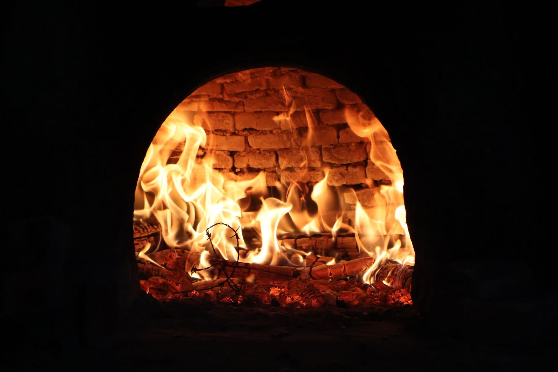 Fire burning inside a brick dome